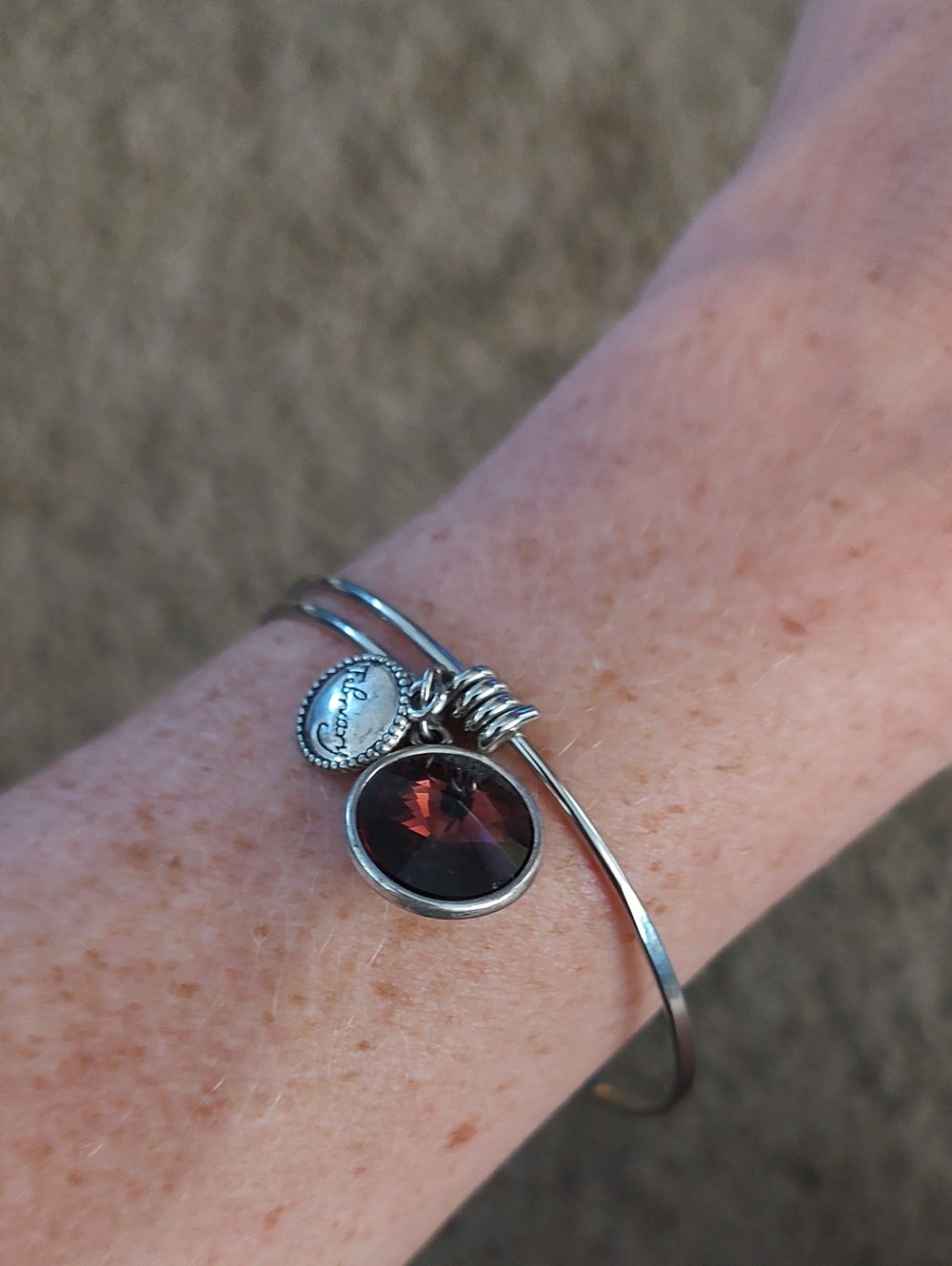 Silver Adjustable Bracelet with Dark Red Gem and Logo Charm